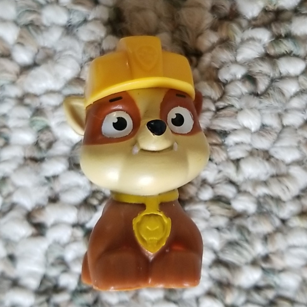 Tiny plastic puppy